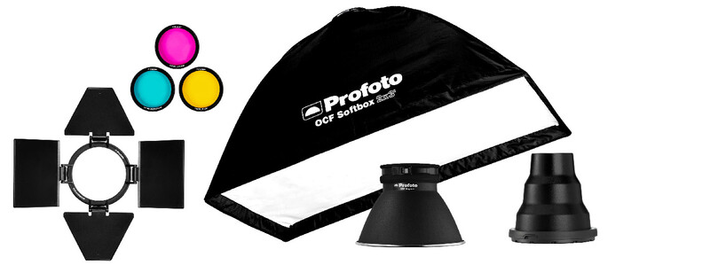 Profoto lighting equipment including softbox, reflector cones, barndoors, and color gels displayed against white background.