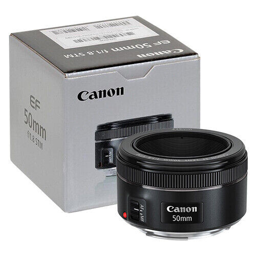 Canon EF 50mm f/1.8 STM lens with its original retail packaging box.