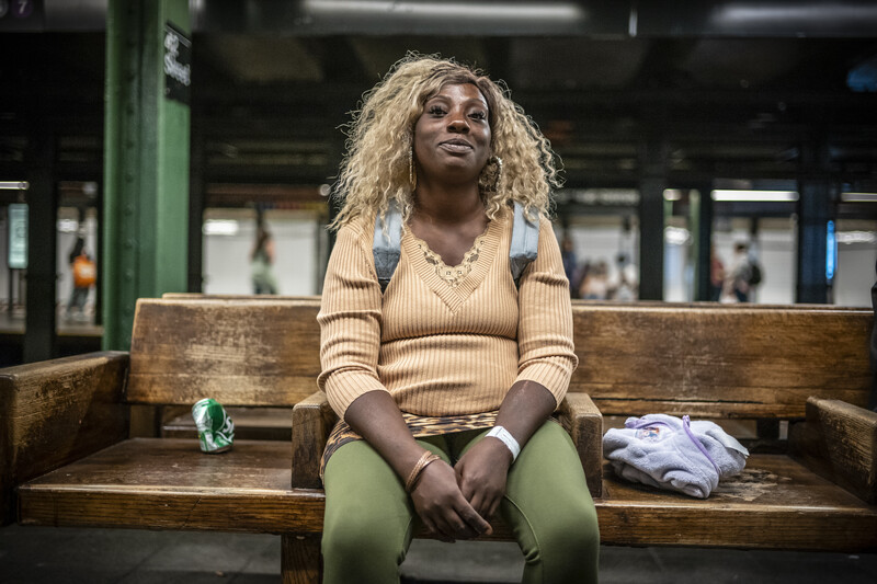 Woman at 42nd Street subway station in New York City.