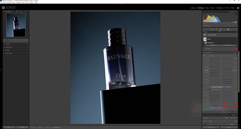 Screenshot of product photography editing in post-processing software showing a fragrance bottle against blue background.