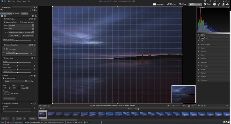 Screenshot of photo editing software showing a twilight landscape with grid overlay and histogram panel.