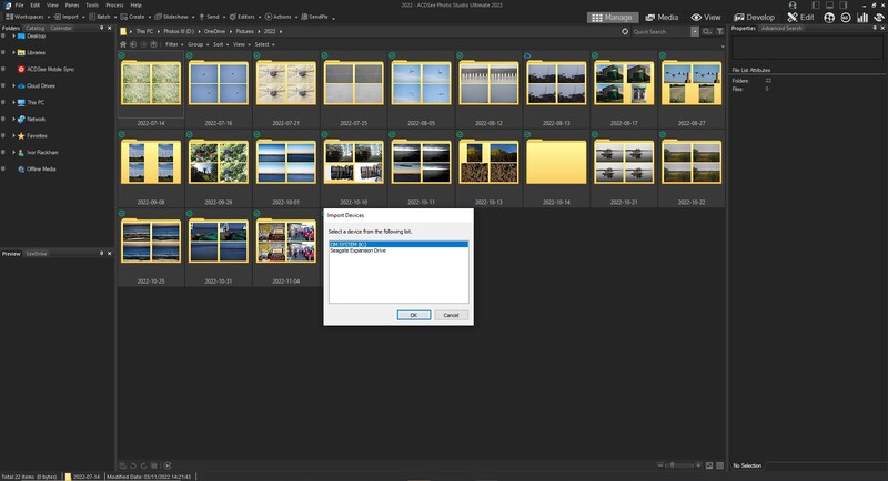 Screenshot of a photo management software showing a grid of image thumbnails with a dialog box open in the center.