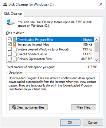 Screenshot of Windows Disk Cleanup utility showing files eligible for deletion and storage space analysis.