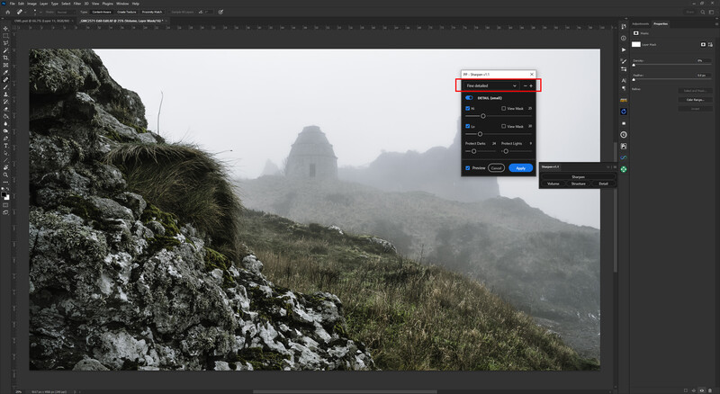 Screenshot of Adobe Photoshop showing a misty mountain landscape with rocky outcrop and forest.