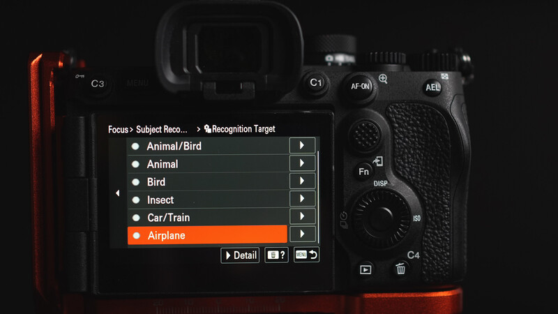 Screenshot of camera autofocus menu showing recognition target options with Airplane highlighted in orange.