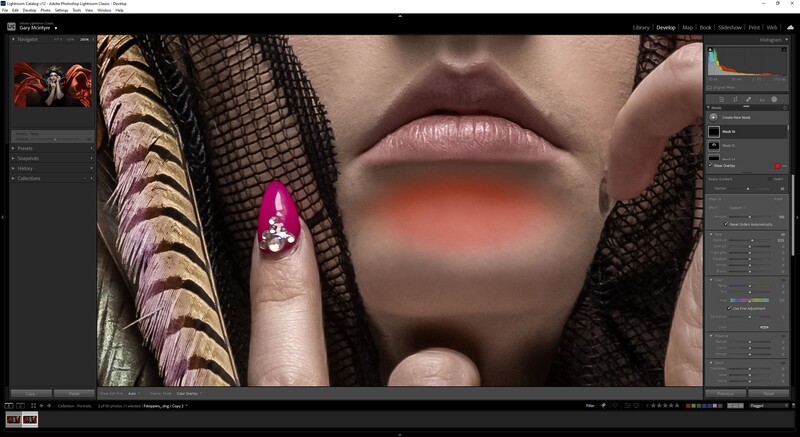 Close-up beauty portrait with magenta nail art, textured fabrics, and warm skin tone lighting during post-processing.