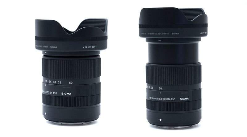Two black Sigma telephoto zoom lenses with lens hoods displayed side by side.