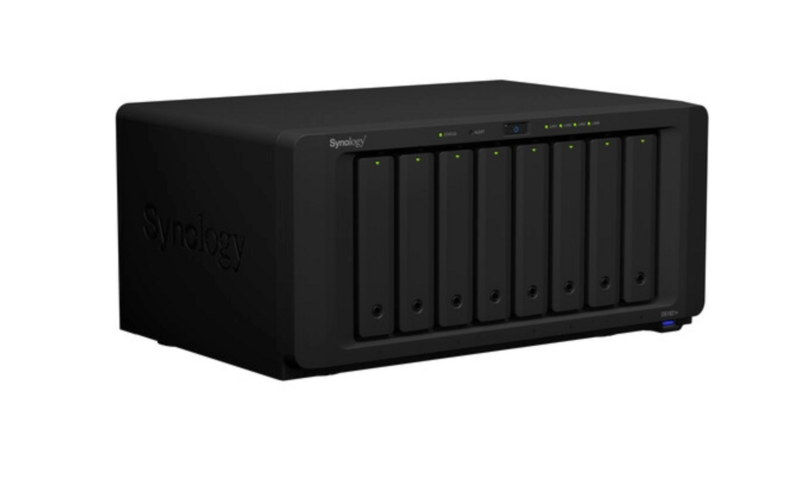 Black eight-bay network-attached storage device with vertical drive slots and front-mounted controls.