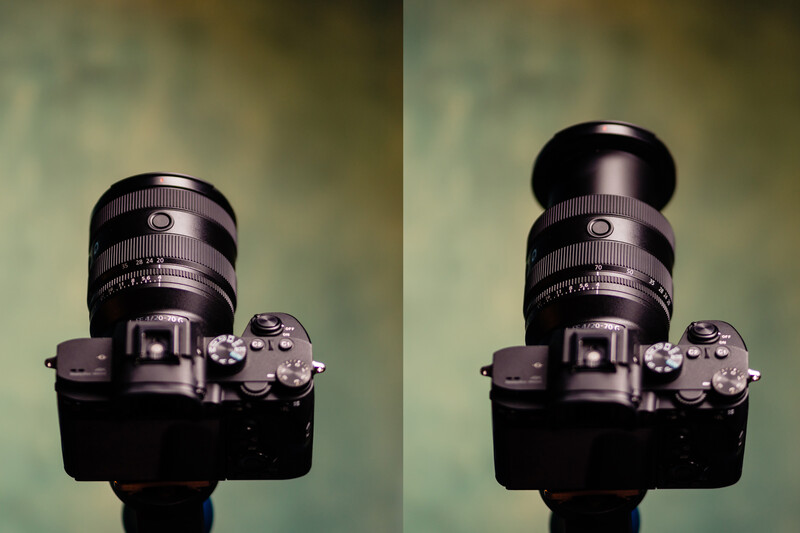 Mirrorless camera with prime lens shown from above in two positions, demonstrating lens hood extended and retracted.