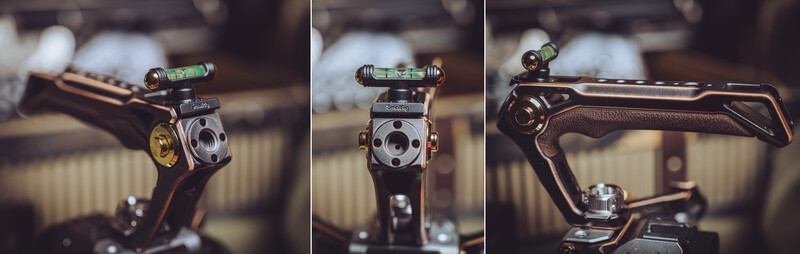 Three close-up views of precision camera equipment with spirit levels mounted on top and mechanical components visible.