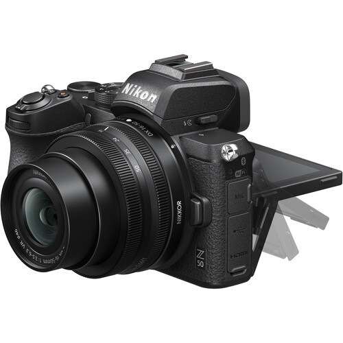 Nikon Z mirrorless camera with attached wide-angle lens and articulating LCD screen.
