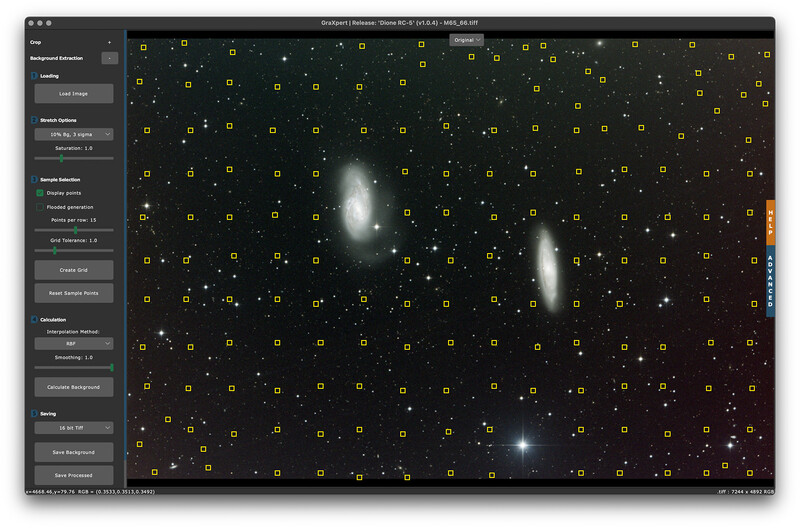 Screenshot of astronomy software displaying star catalog with two bright galaxies centered in the field of view.