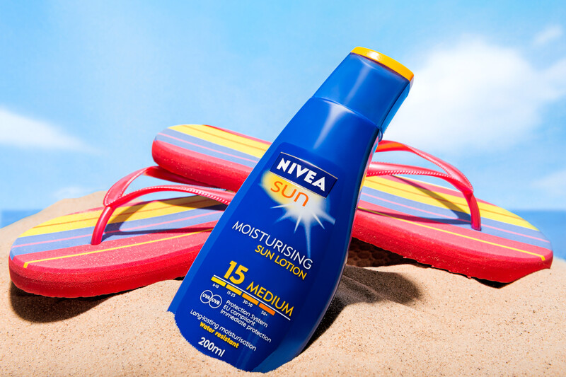 Sun Lotion &amp; Flip Flops on the Beach
