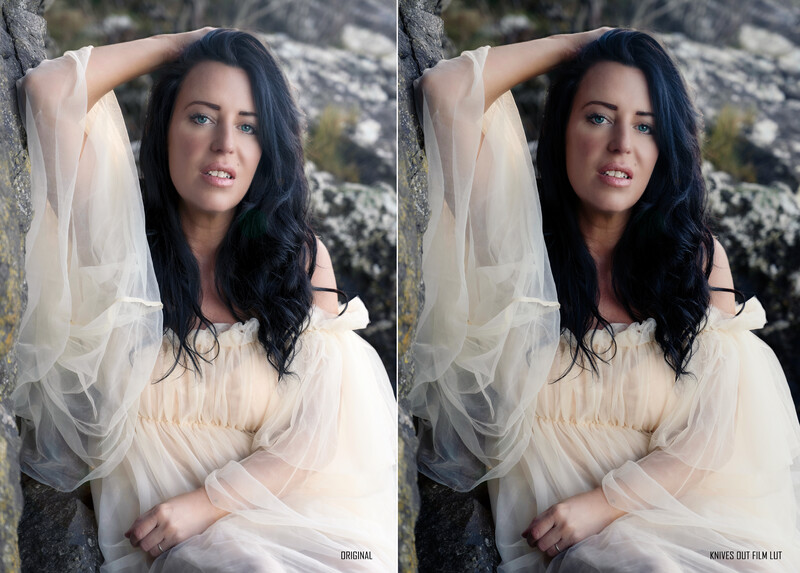 Woman with long dark hair wearing sheer white fabric against a textured stone wall.