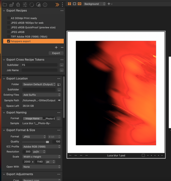 Screenshot of photo editing software showing a red and orange gradient abstract image with motion blur effect.