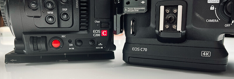 Canon EOS C200 and EOS C70 cinema cameras displayed side by side from above.