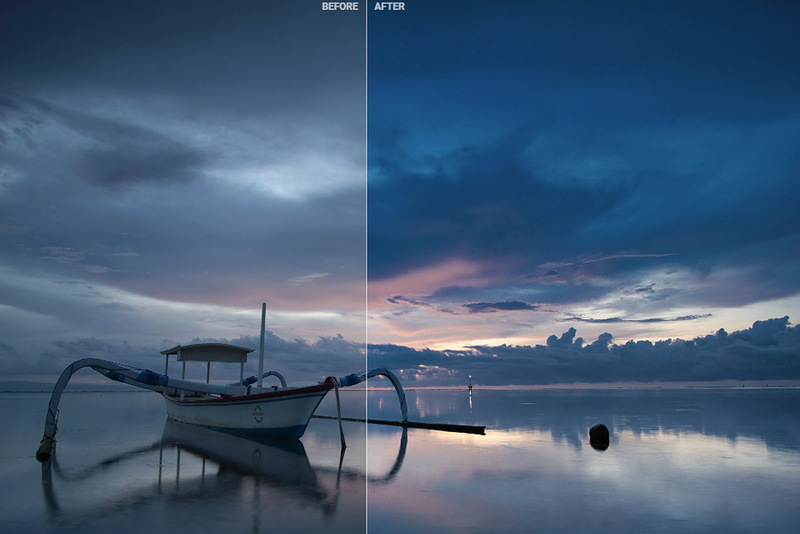 Traditional wooden fishing boat anchored in still water during twilight with dramatic cloudy sky reflected in glassy surface.