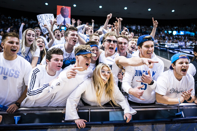 Fans screaming at basketball game