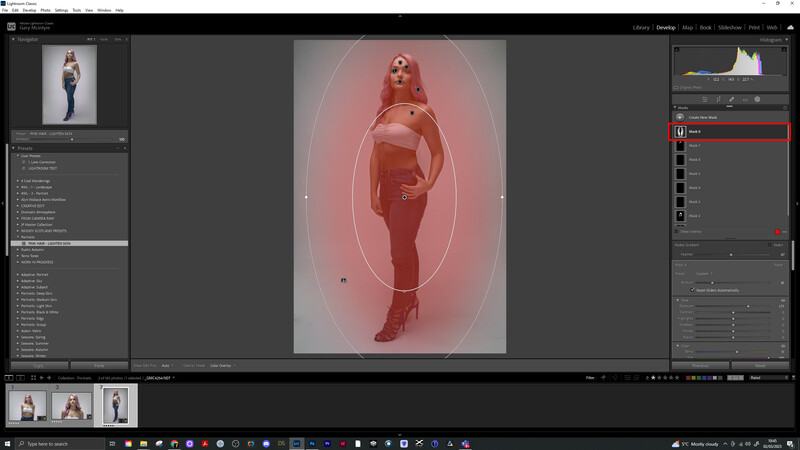 Screenshot of photo editing software showing a portrait with red-toned vignette effect applied.