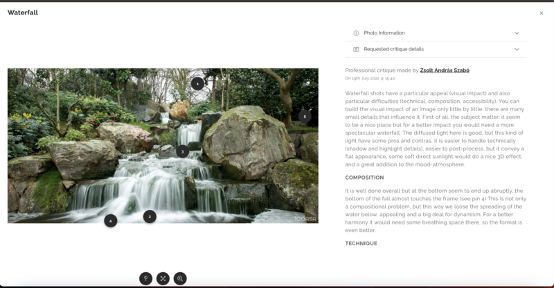 Multi-exposure composite photograph of a cascading waterfall flowing through lush forest vegetation.