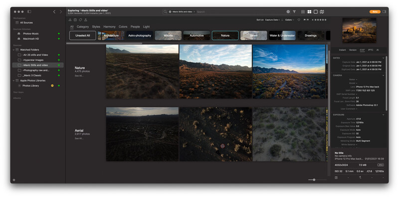 Screenshot of photo management software displaying landscape and aerial nature photography organized in a grid layout.