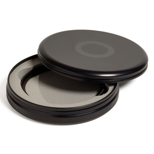 Two black circular filter cases with felt-lined interiors, one open and one closed, stacked together.