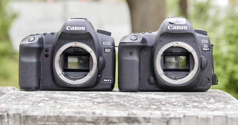 Canon EOS 5D Mark II and Canon EOS R5 camera bodies positioned side by side without lenses.