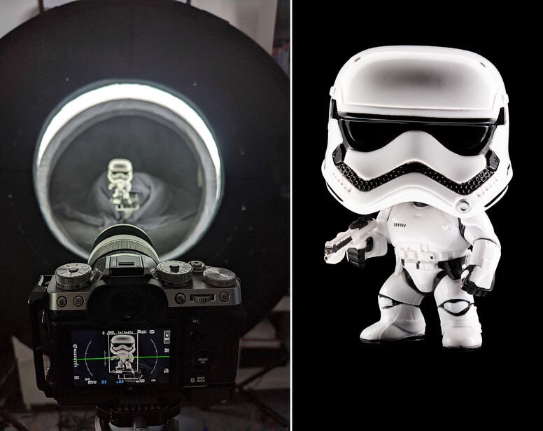 Comparison of a camera with ring light and a stylized white stormtrooper figurine against black background.