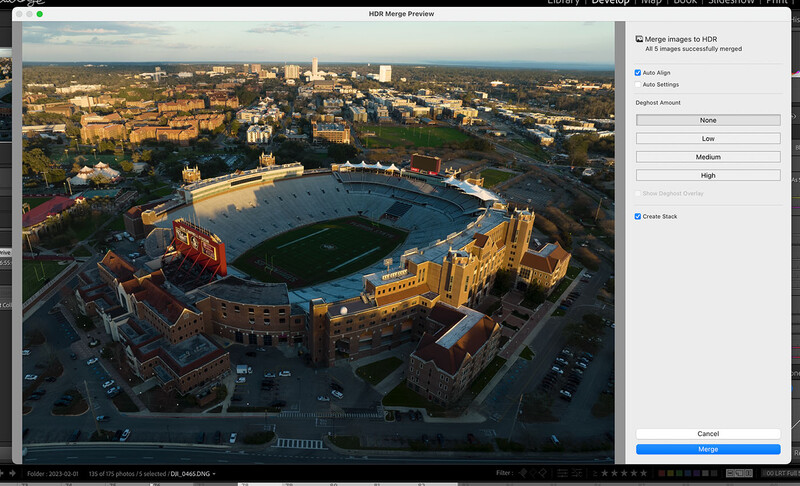 Screenshot of image editing software displaying an aerial photograph of a large stadium with surrounding cityscape.
