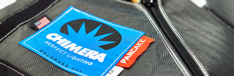 Chimera Perfect Lighting label and Pandrake badge on gray equipment case.