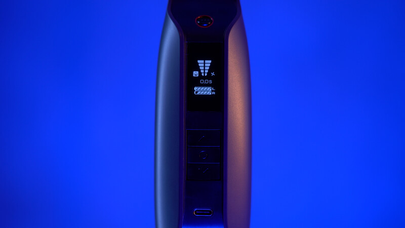 Sleek vertical device with illuminated display screen against vibrant blue gradient background.