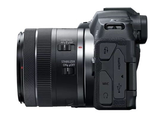 Canon mirrorless camera with attached RF-mount zoom lens, shown from the right side against a white background.