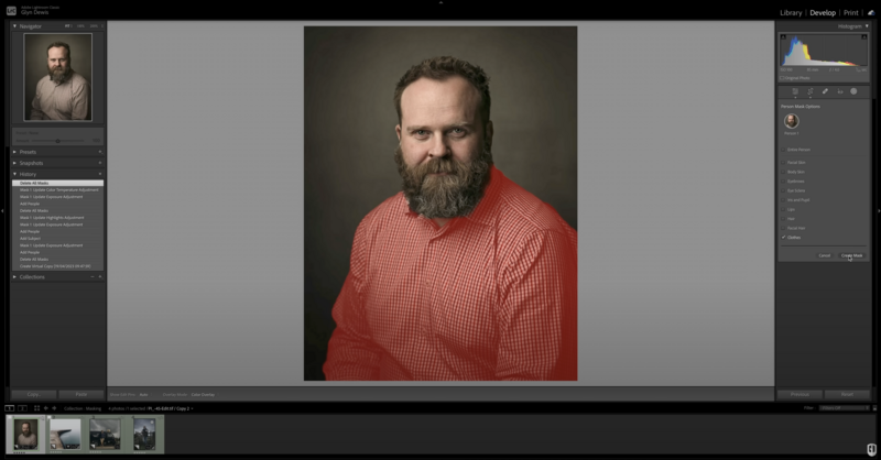 Portrait of a bearded man wearing a red checkered shirt against a neutral background.