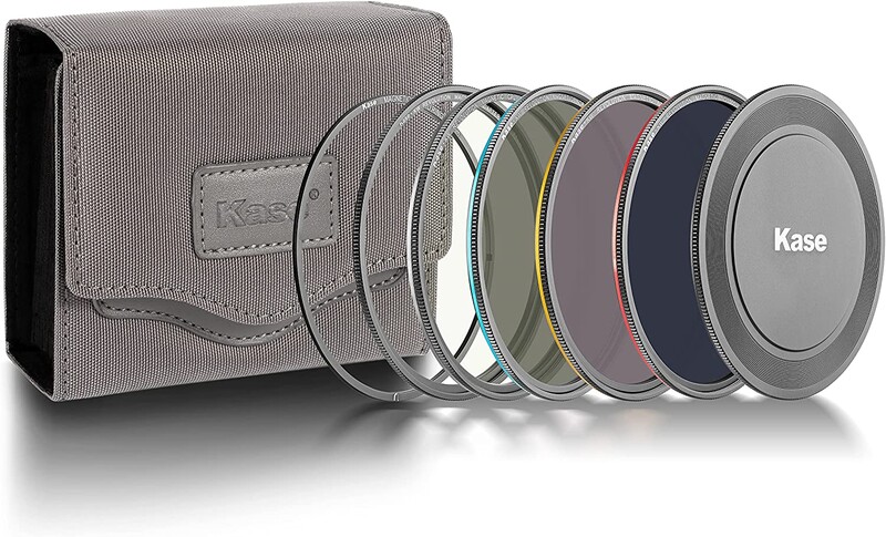 Kase filter kit with gray carrying case and six circular optical filters arranged in a row.