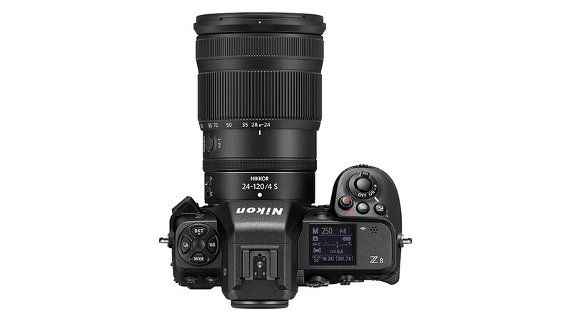 Nikon Z6 III mirrorless camera with 24-120mm f/4.5 lens mounted, shown from above against white background.