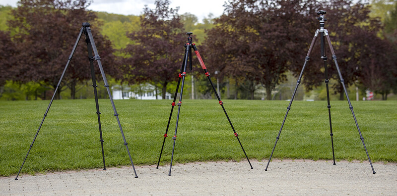 The Peak Design Travel Tripod, Manfrotto BeFree, and Roadtrip Classic Leather tripods at their max height without center columns extended.