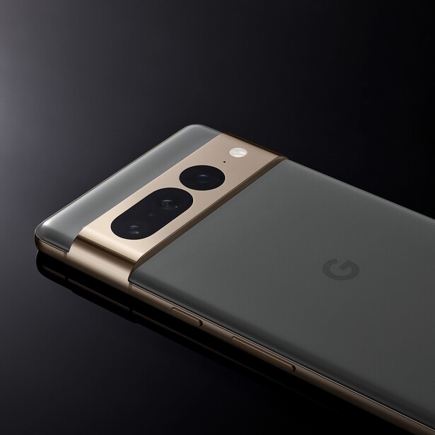 Smartphone with dual-lens camera module featuring gold and black color blocking against dark background.