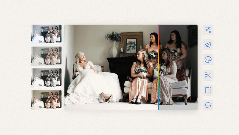 Bride in white dress seated with bridesmaids in a living room during wedding preparation.