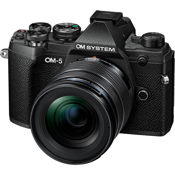 OM System OM-5 mirrorless camera with attached lens and multiple lenses displayed around it.