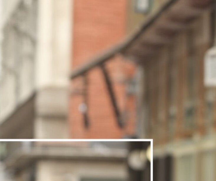 A crop of Ai-generated content using Adobe's Generative Fill, showing an example of how it struggles with building details