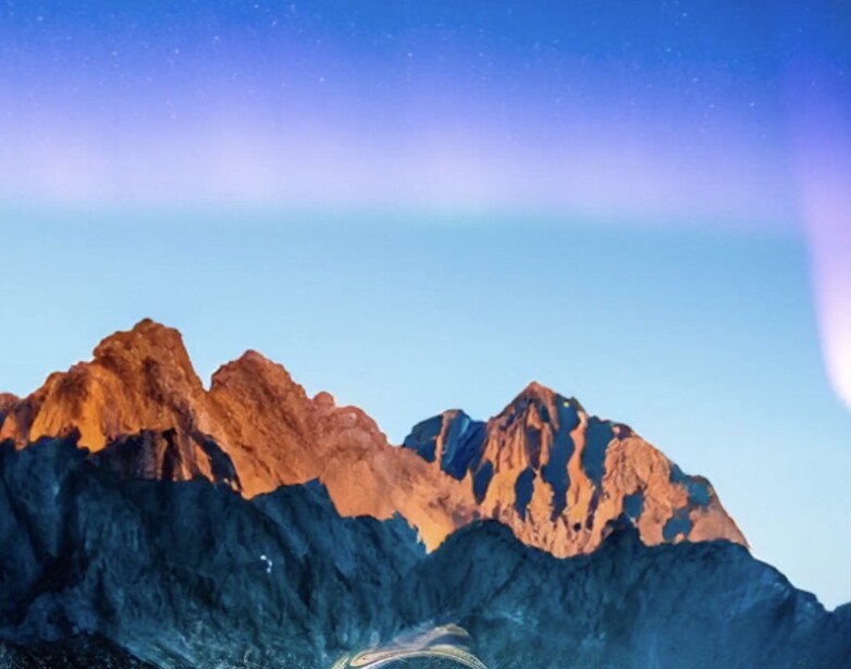 Adobe Generative Fill adding mountains and aurora borealis to an image
