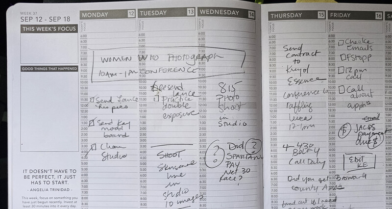 Handwritten weekly planner spread for September 12-18 with photography shoot notes and scheduling details.