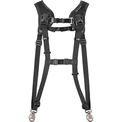Black shoulder harness with dual straps, chest buckles, and metal attachment points.