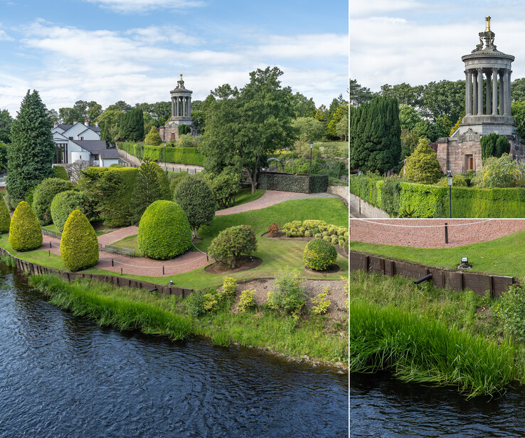 Manicured riverside garden with topiary, brick pathway, and distant tower structures.