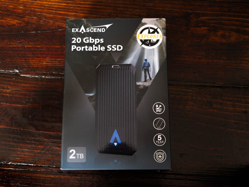 Exascend 20 Gbps Portable SSD 2TB packaging displayed on wooden surface.