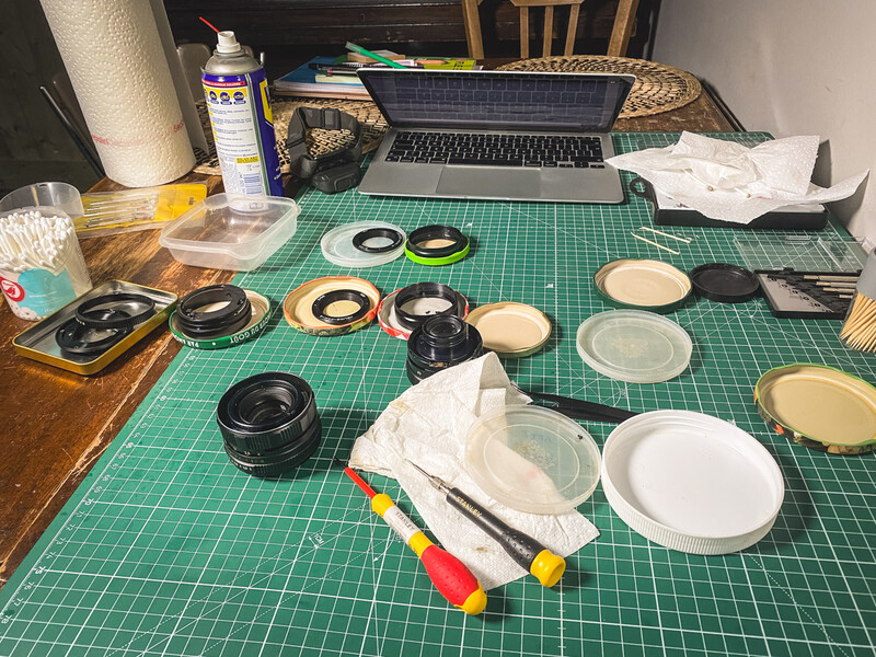 Taking apart two Helios 44M-4 lenses at the same time.