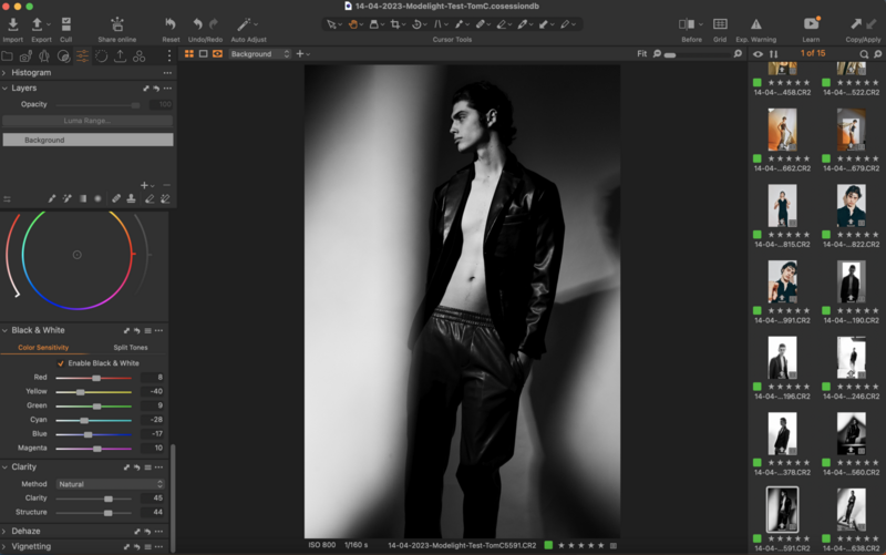 Screenshot of professional photo editing software showing black and white portrait of man in leather jacket.