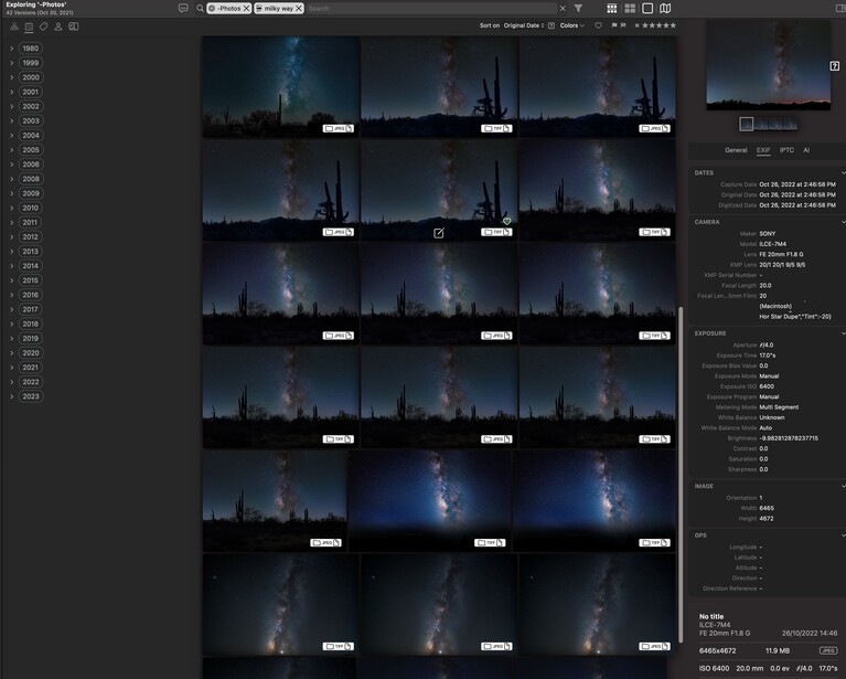 Screenshot of photo editing software displaying a contact sheet grid of nighttime cityscapes with illuminated buildings and sky.