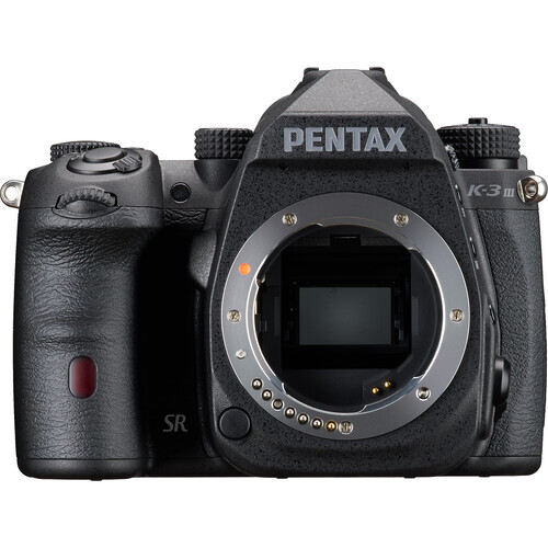 Pentax K-3 Mark III DSLR camera body shown from front with lens mount visible.