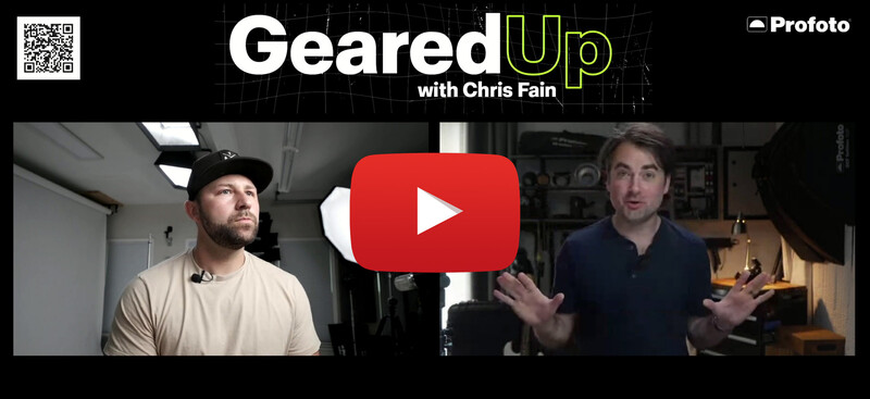 Screenshot of a YouTube video featuring two men in a studio setting with professional lighting equipment visible in the background.